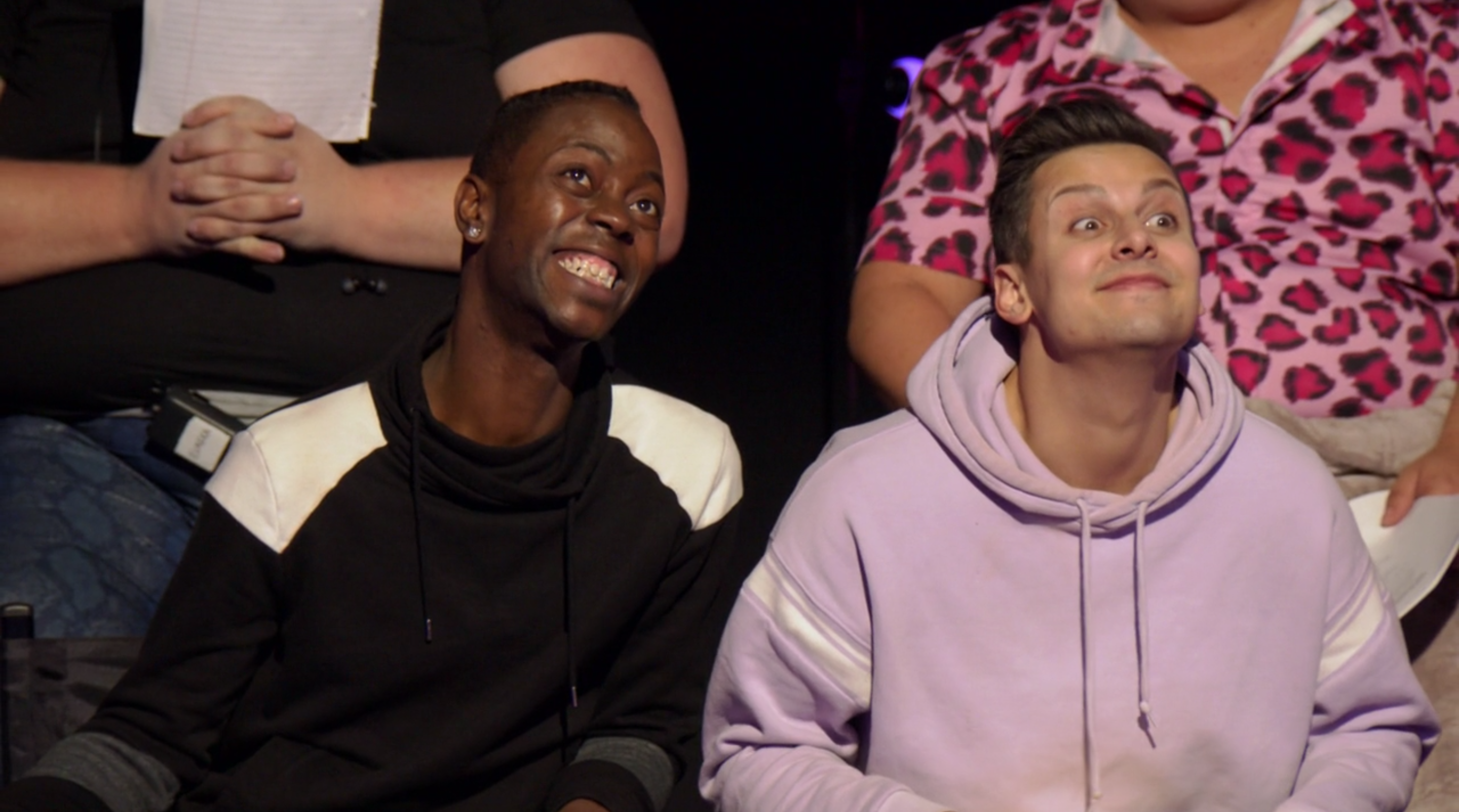 Ra'Jah and Jan holding their eyes wide open.